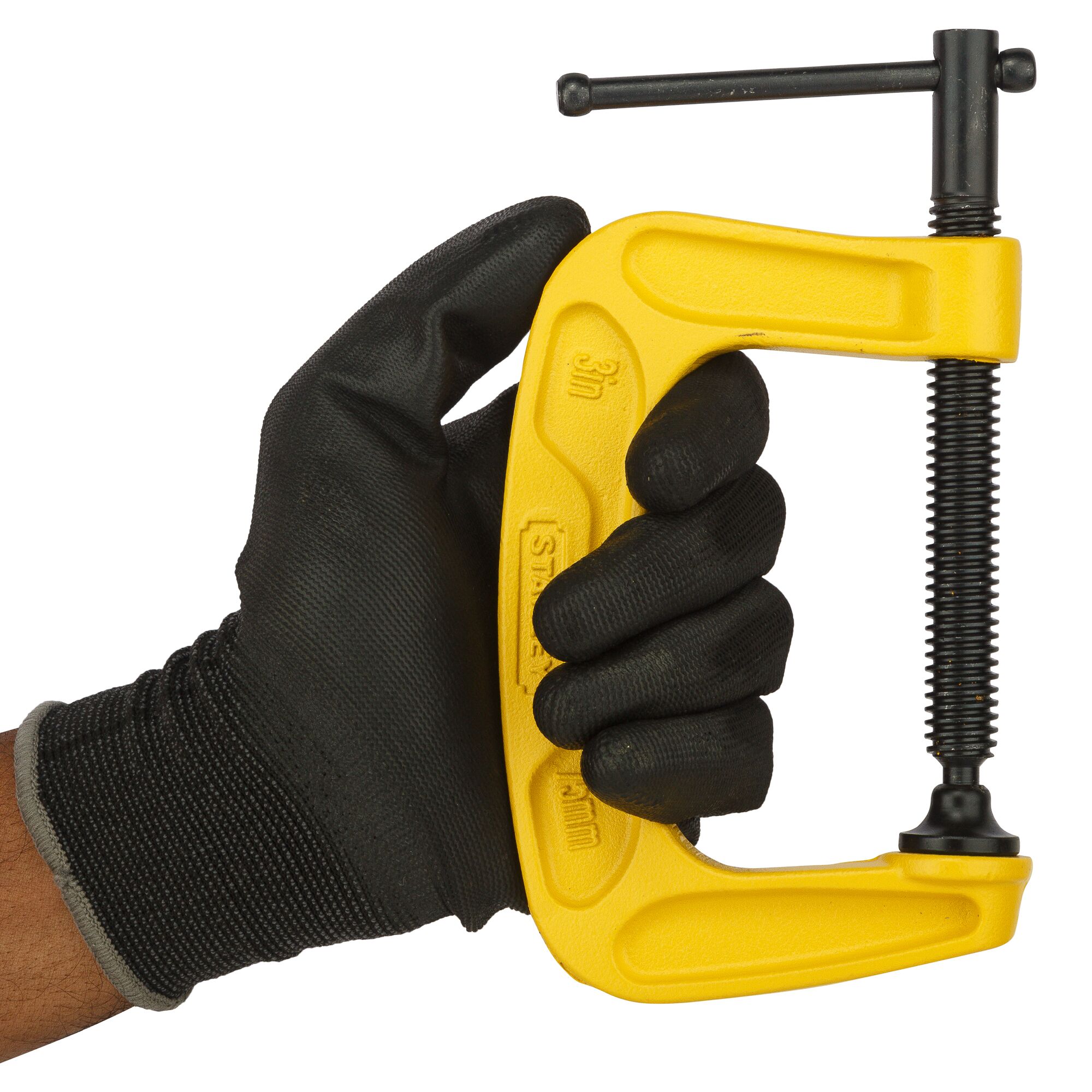 Stanley 0-83-033 C-clamp, yellow, held in gloved hand, side angle, photography.