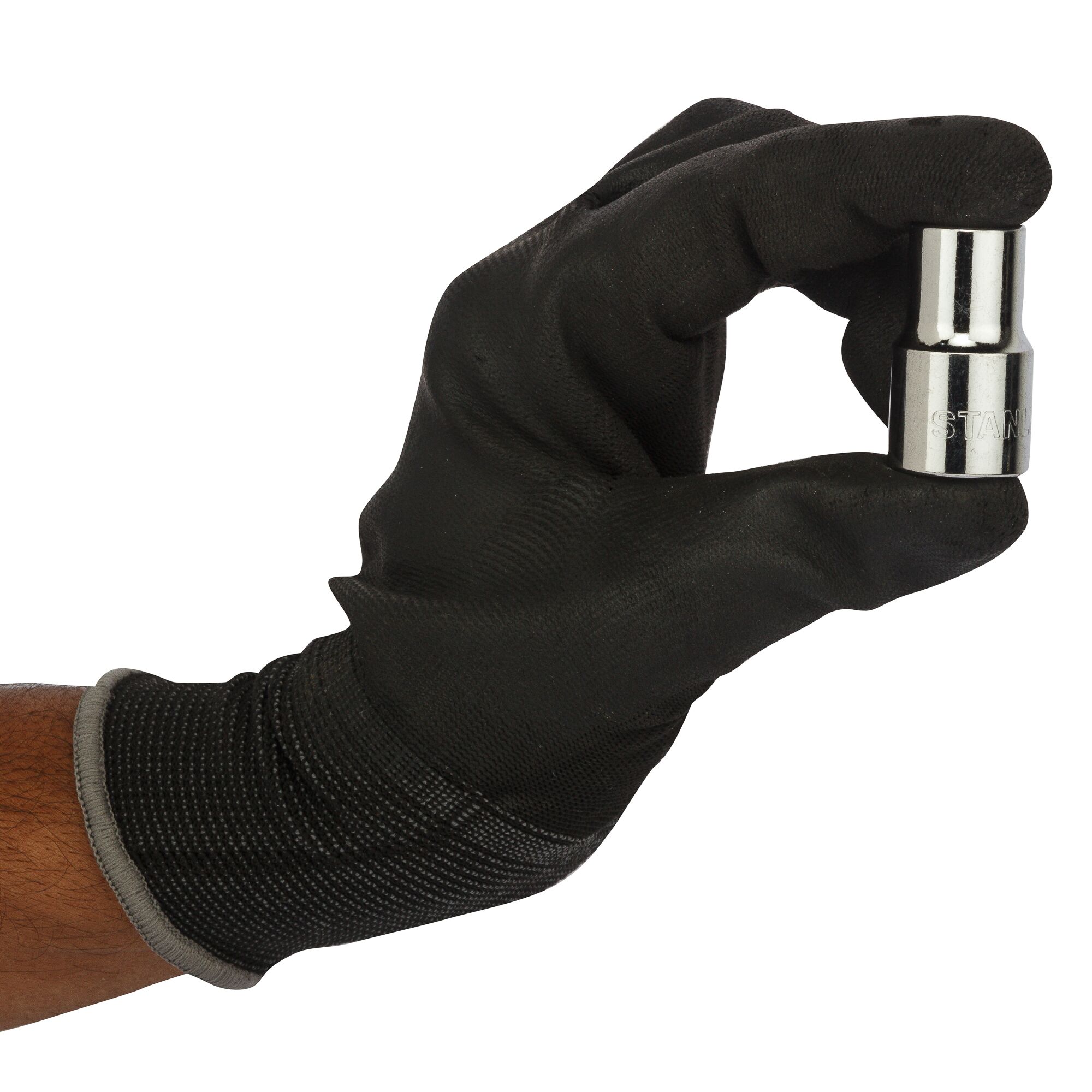 Photo of STANLEY 1-86-544 socket held in gloved hand, tool category, side angle, metallic finish.