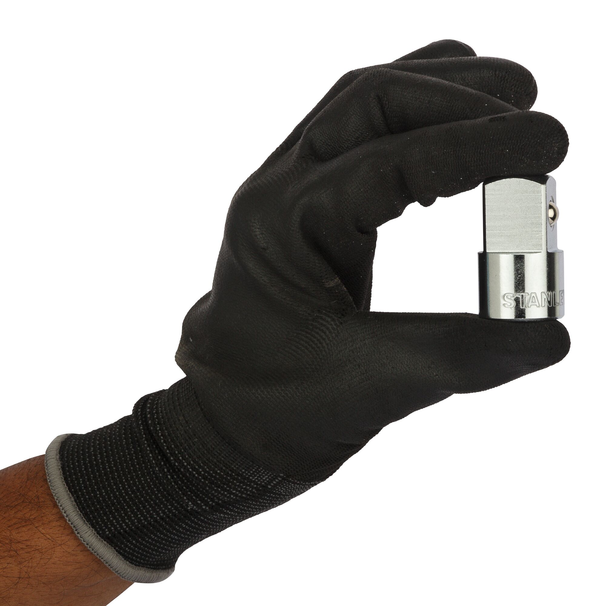 Stanley 1-88-558 socket adaptor held in gloved hand, side angle, silver metal finish.