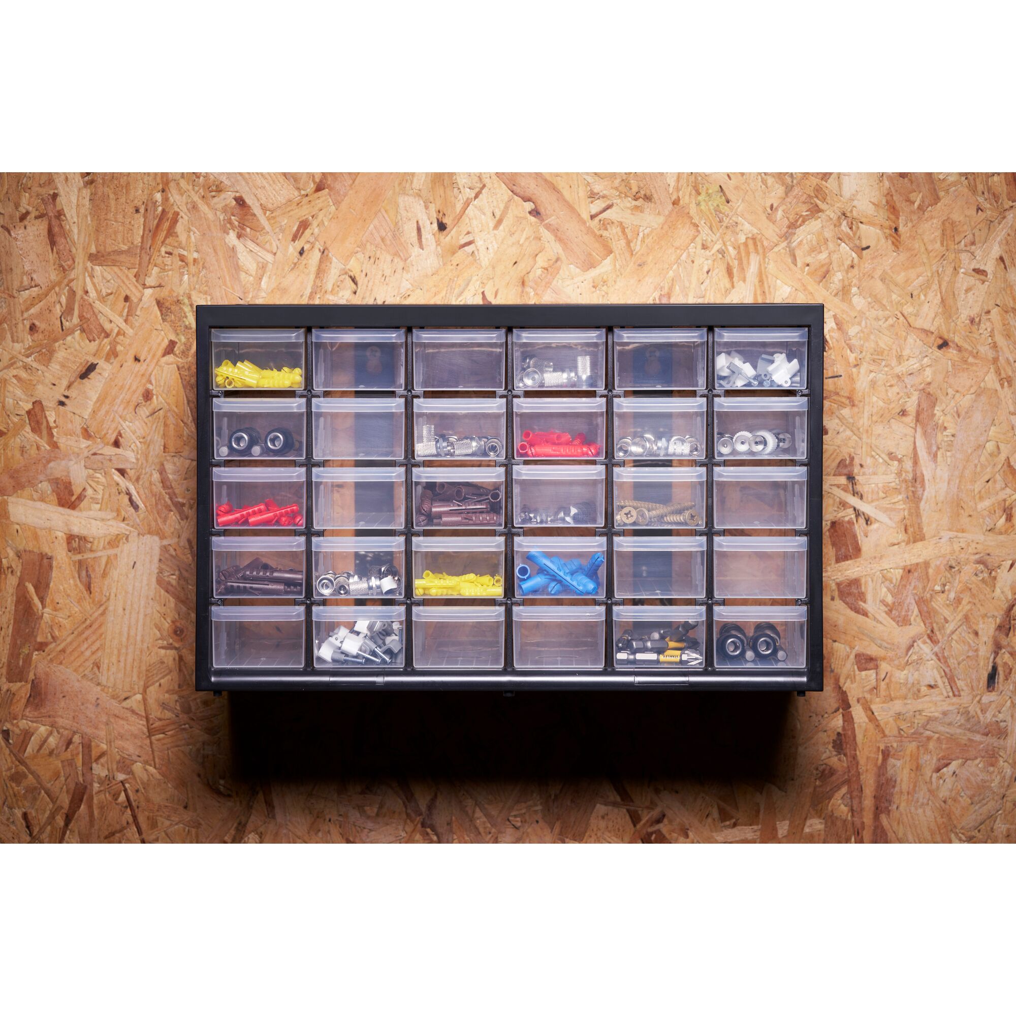 STANLEY 1-93-980 organizer with 24 clear drawers holding assorted hardware, wall mounted front view.