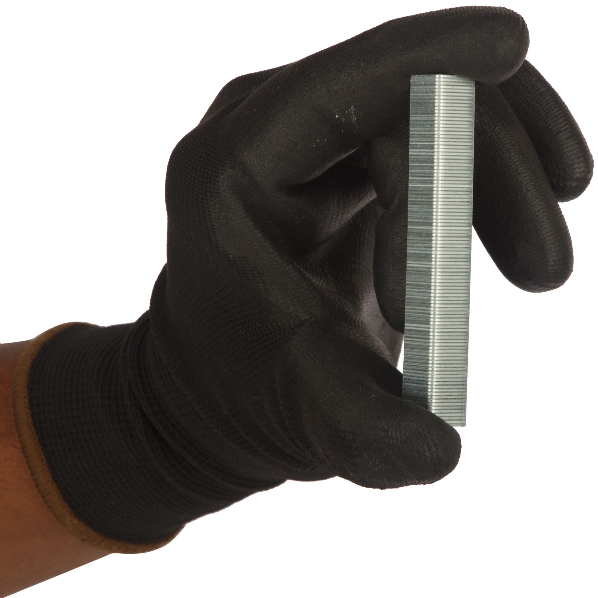 STANLEY 1-TRA206T staples stack held by gloved hand, product side view, photography.
