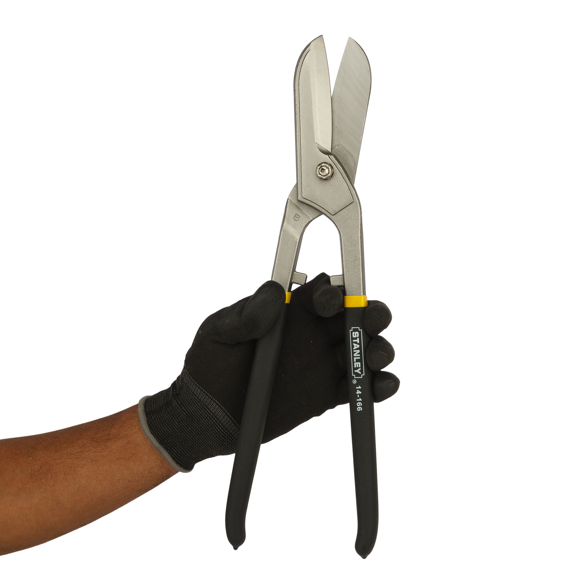 Stanley 14-166 straight-cut aviation snips held by gloved hand, side view, black and yellow handle.