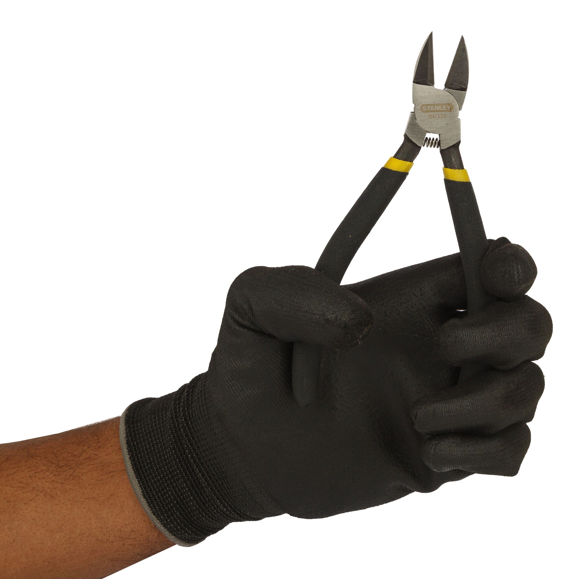 Photo of STANLEY 84-135-1-23 diagonal cutting pliers held in a gloved hand, close-up, on white background.