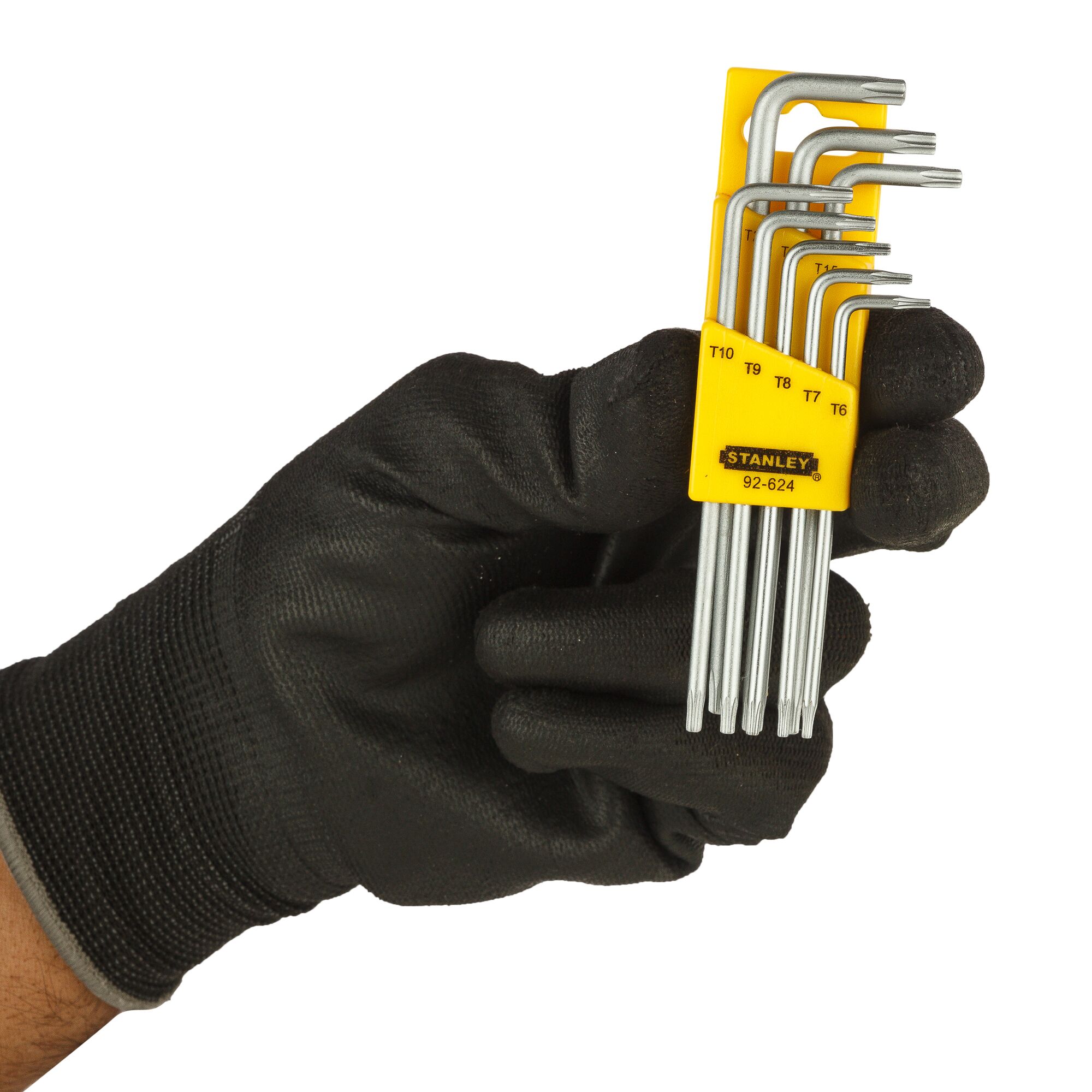 STANLEY 92-624 Torx key set in yellow holder, photography of hand in black glove holding tool.