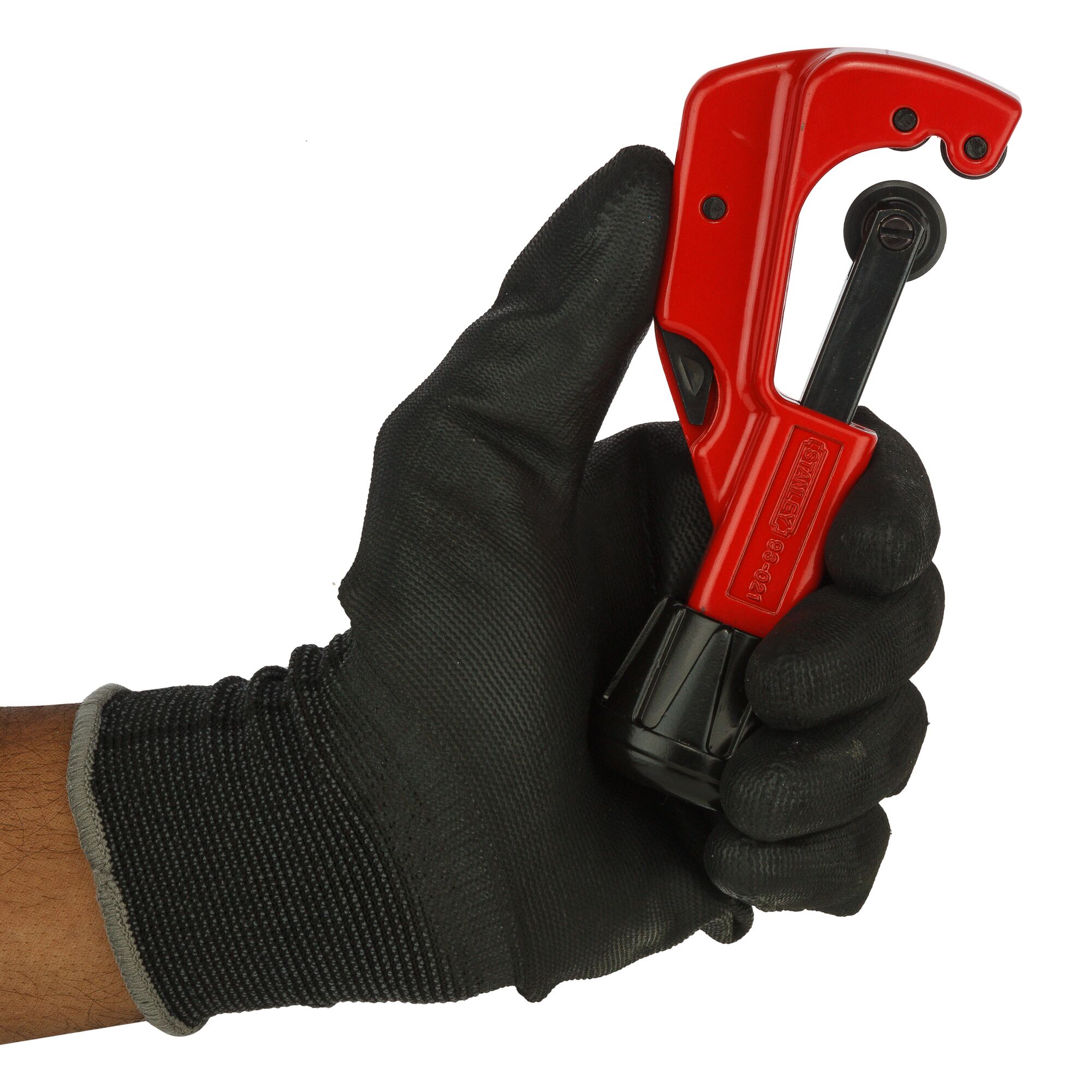 STANLEY 93-021-22 pipe cutter held in gloved hand, red and black, close-up, photography product category.