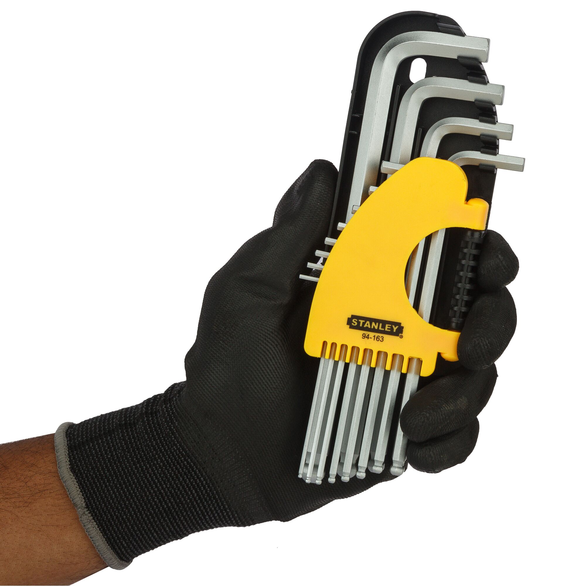 Stanley 94-163-23 hex key set in yellow holder, held in a gloved hand, product photography.
