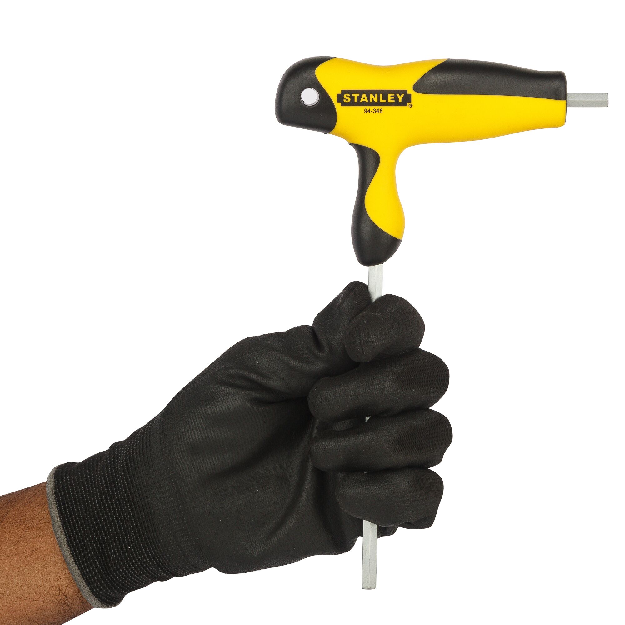 Photo of STANLEY 94-348 T-handle hex key with yellow and black grip, held by a hand in a black glove.