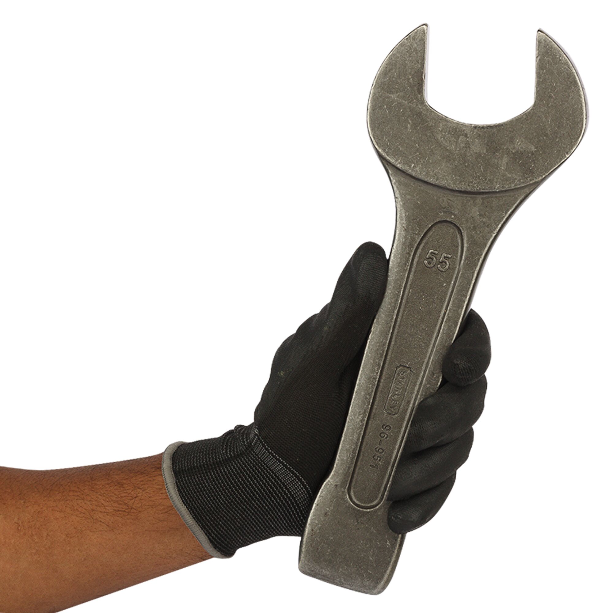 Gloved hand holding a large Stanley 55mm open-end wrench, SKU 96-951, used for industrial applications.
