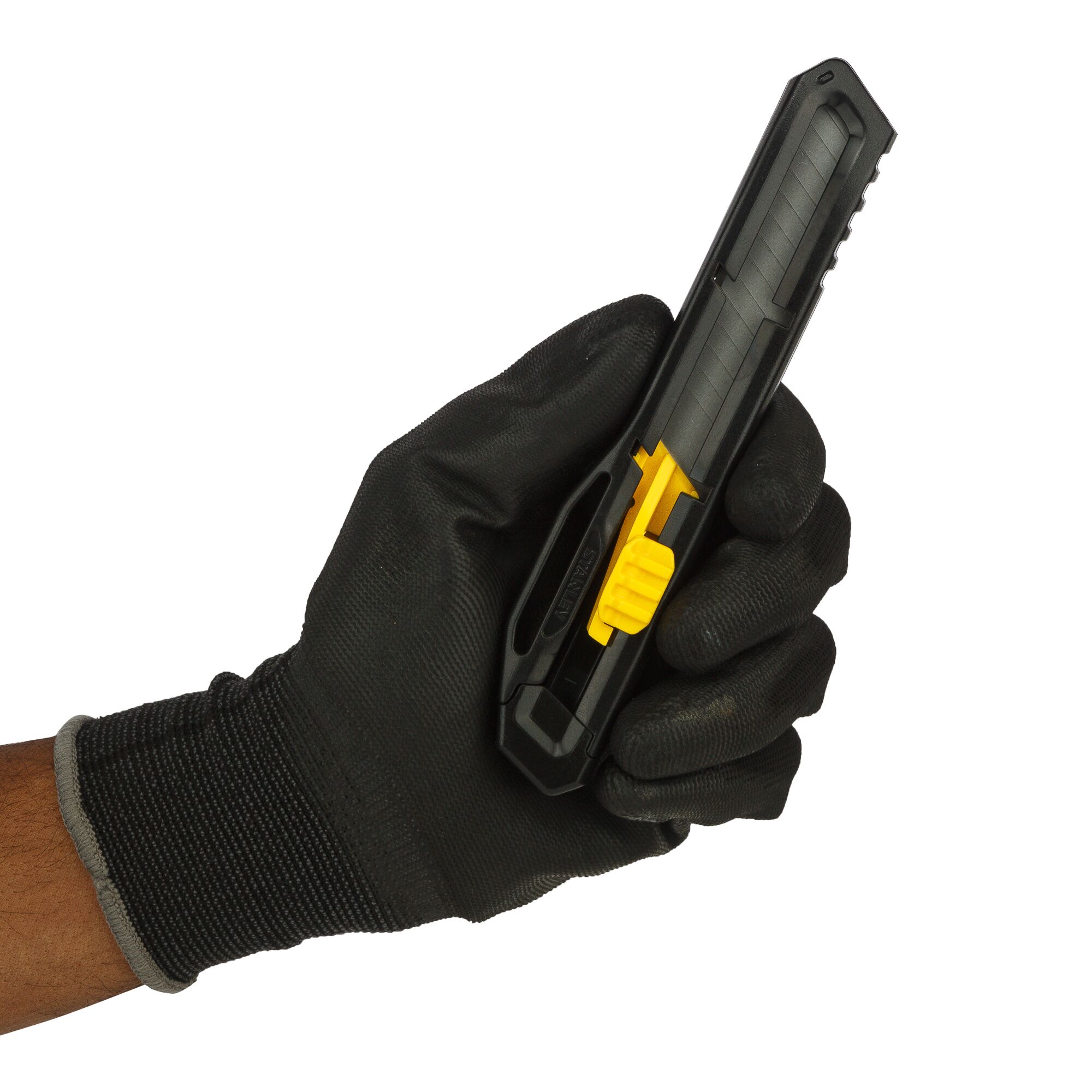 STANLEY STHT10323-800 utility knife with yellow slider held in gloved hand, side angle, white background.