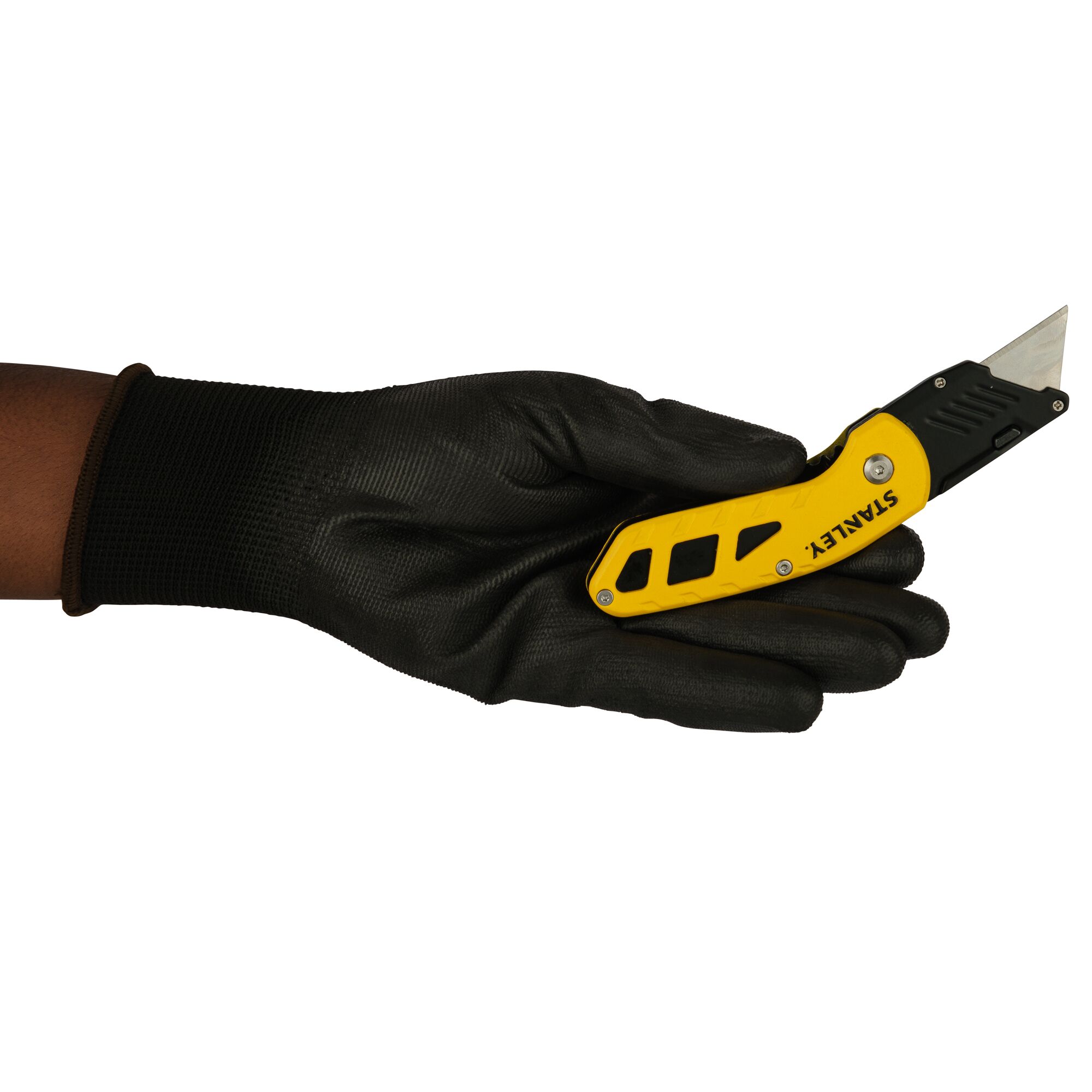 STANLEY STHT10424-0 utility knife in yellow held in a black-gloved hand, side view.