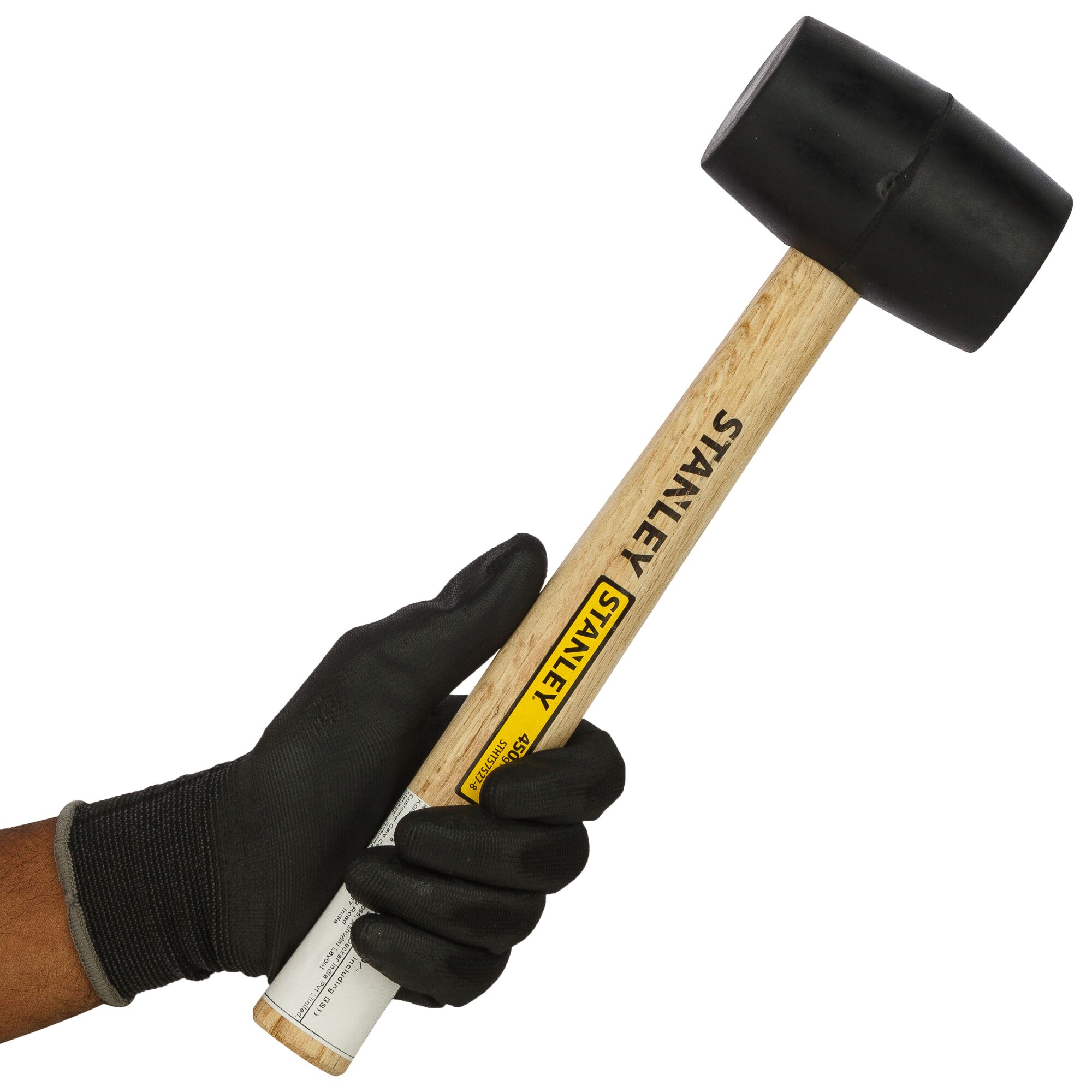 Photo of STANLEY STHT57527-8 rubber mallet with wooden handle held by gloved hand, side angle.