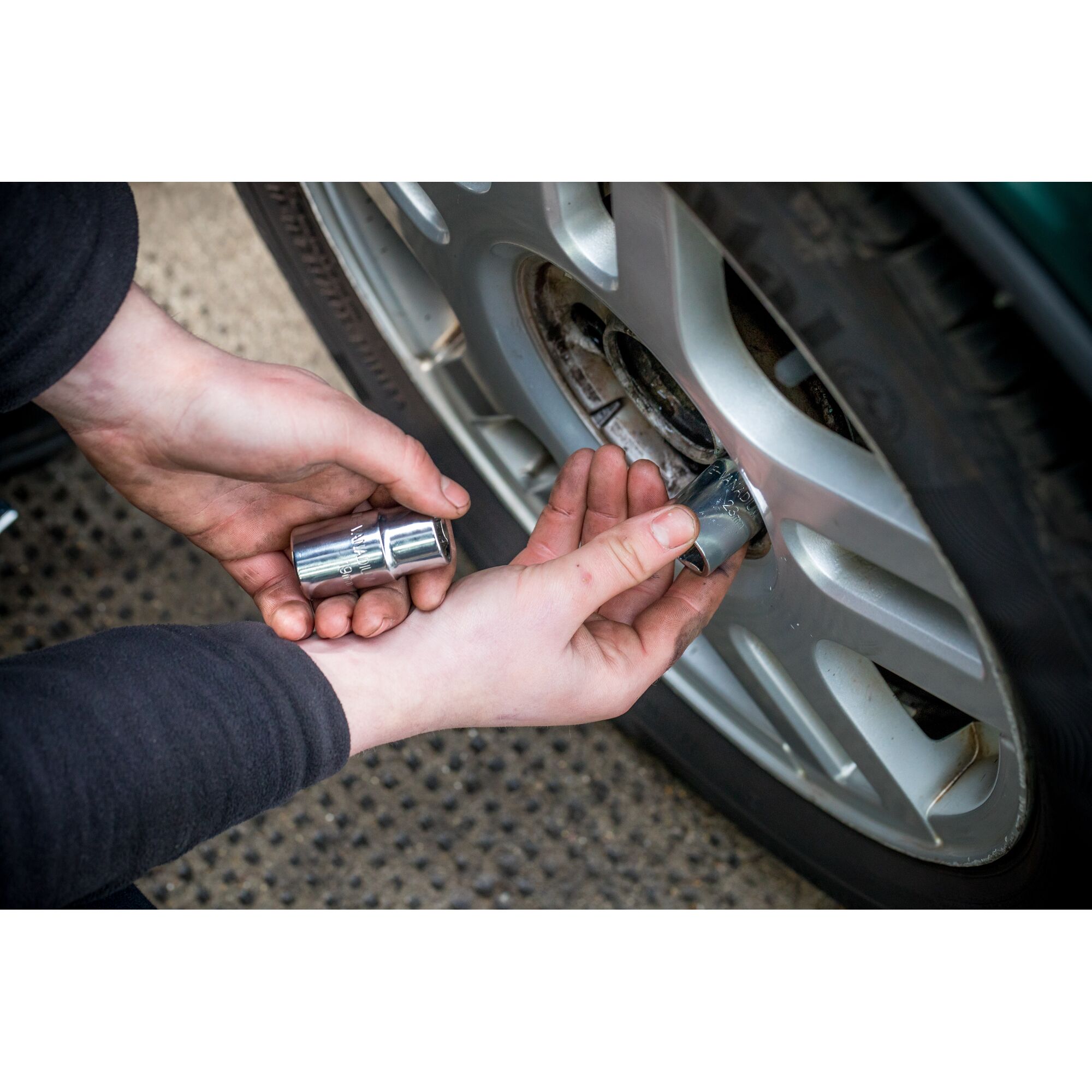 STANLEY STHT80890-0 socket used to remove wheel nut from car tire.