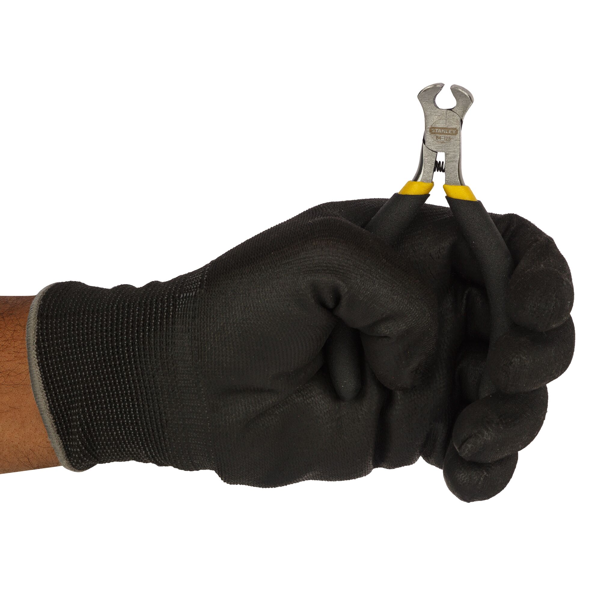 A gloved hand holds a Stanley cutting plier with yellow handles on a white background.