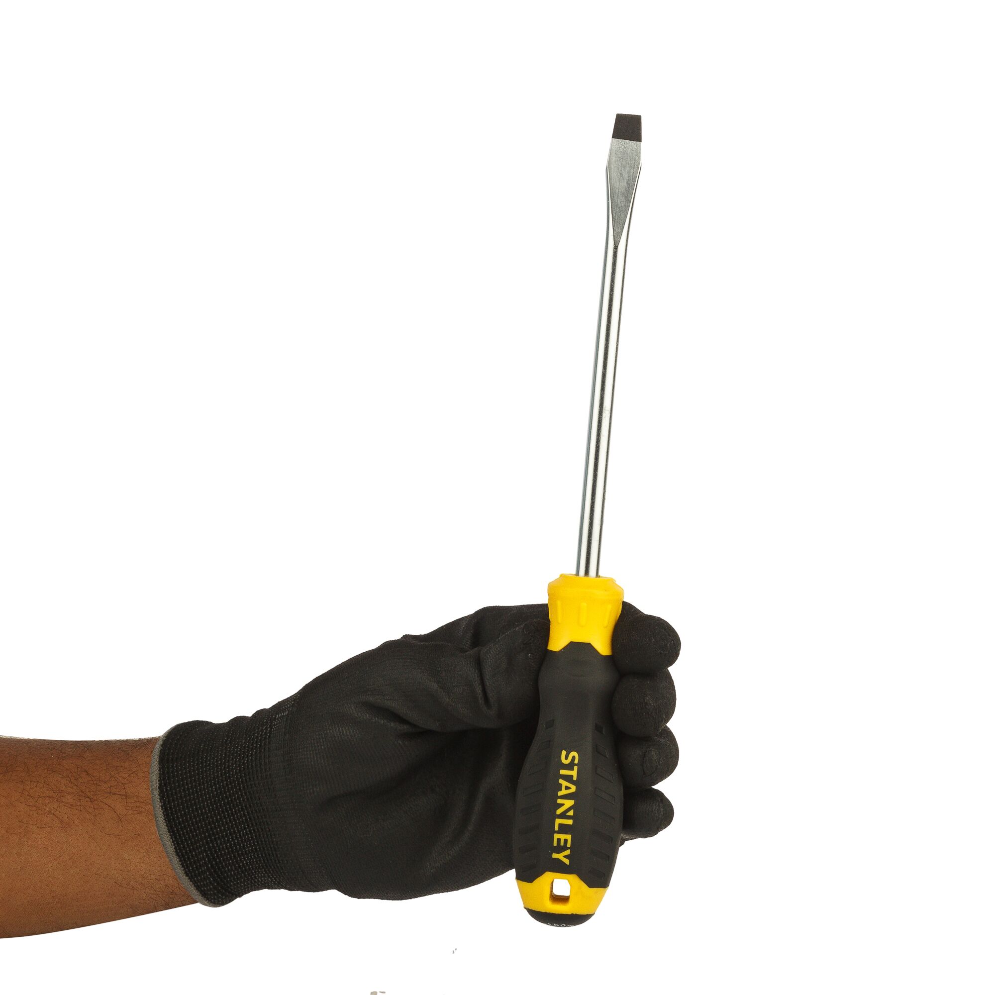 Stanley STMT60831-8 flathead screwdriver with yellow and black handle held by gloved hand, side angle