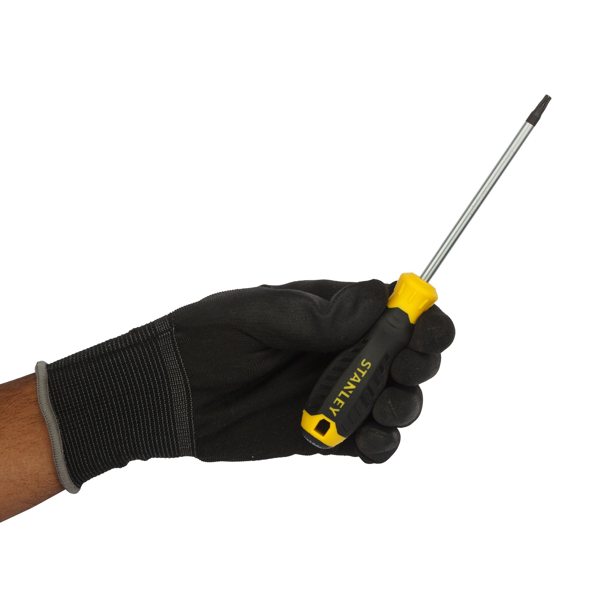 Photo of STANLEY STMT60847-8 screwdriver with black and yellow handle held by a gloved hand, side angle.