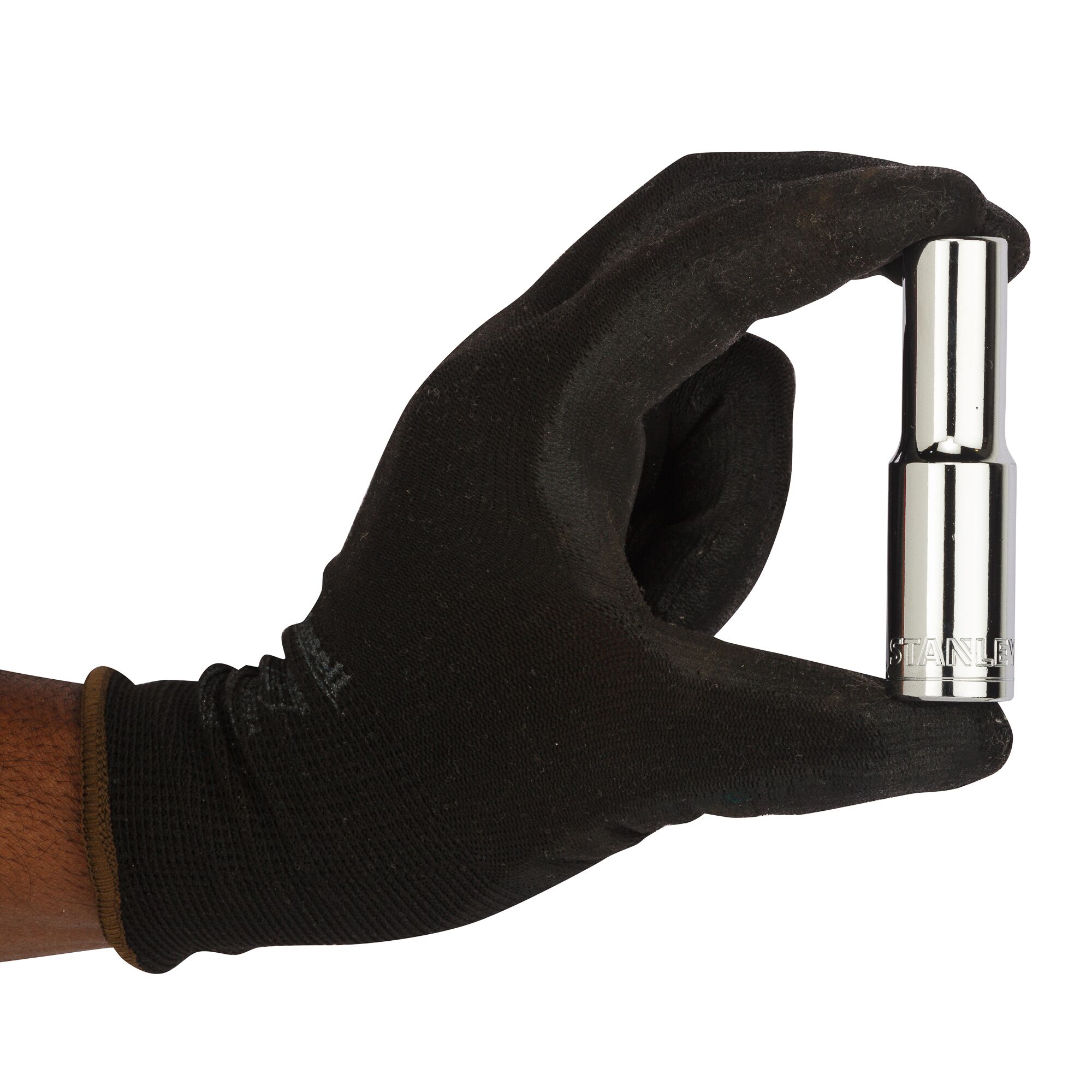 A gloved hand holding a Stanley chrome socket tool against a white background.