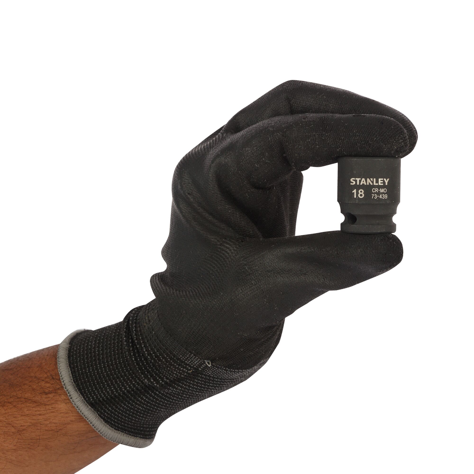 Photo of STANLEY STMT73439-8B socket, black, held by gloved hand, product category photography, side view.