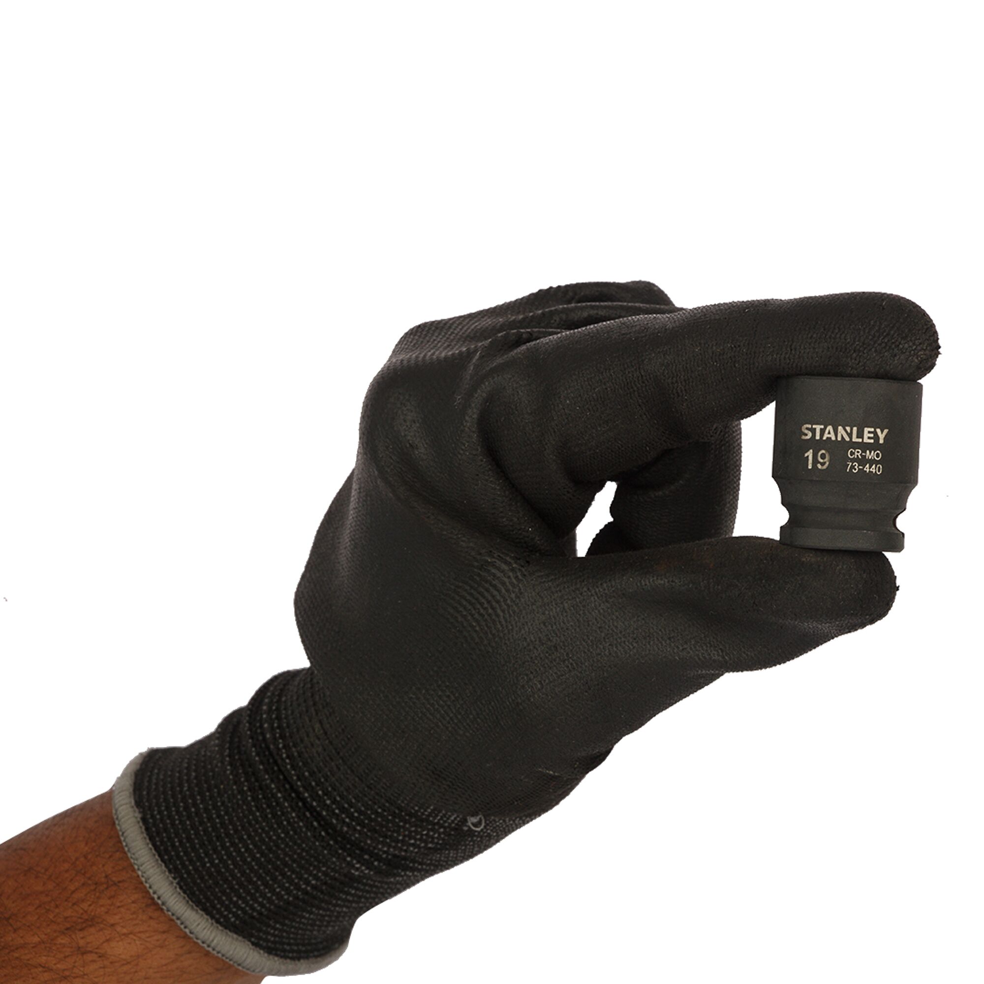 A gloved hand holds a Stanley 19mm socket tool, model STMT73440-8B, used for mechanical or photographic equipment.