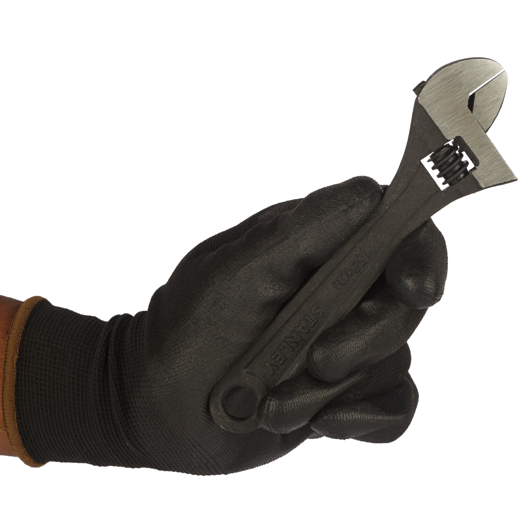 STANLEY STMT74893-8 adjustable wrench held by gloved hand, side view, photography product category.
