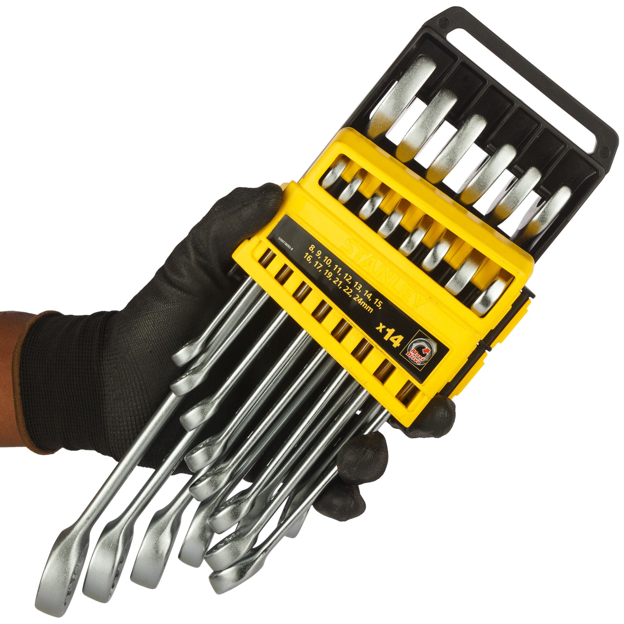 Hand holding a Stanley boxed set of fourteen metal wrenches in a yellow and black organizer.