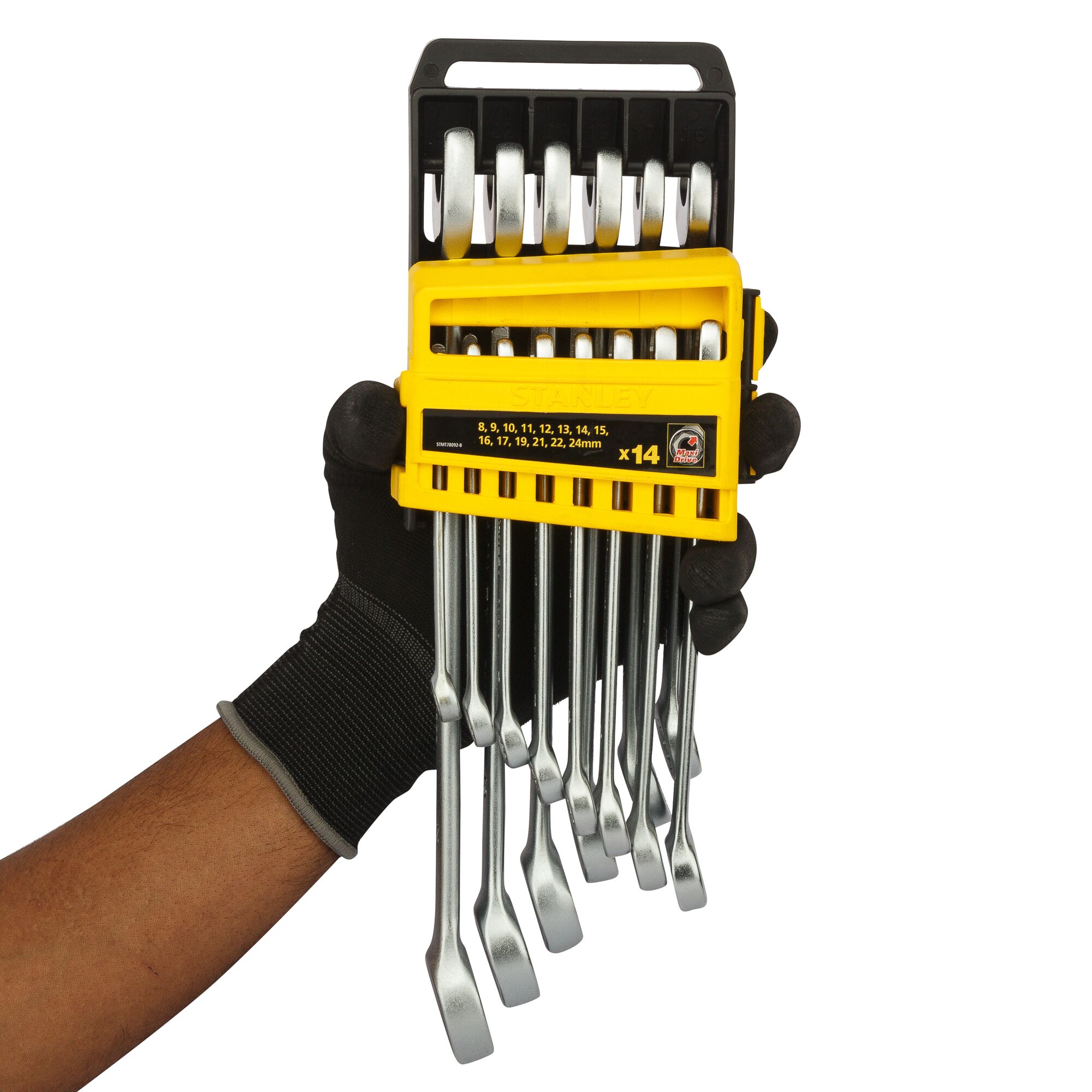 STANLEY STMT78092-8 wrench set in yellow holder, held by gloved hand, front angle.