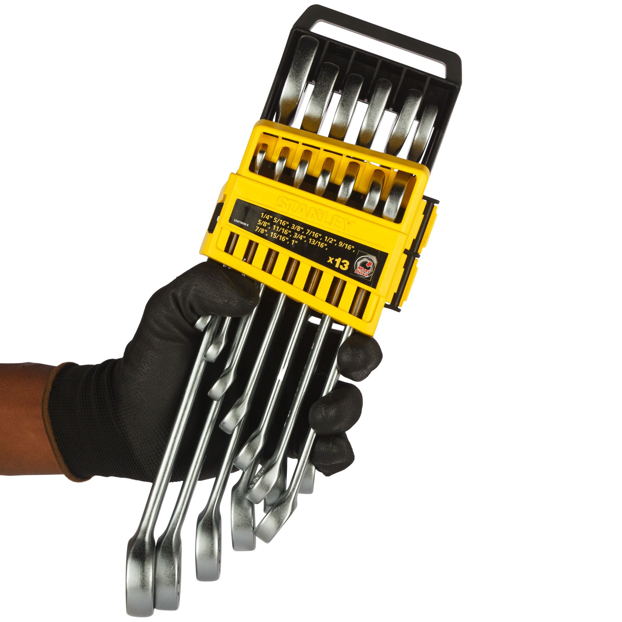 STANLEY STMT78096-8 13-piece wrench set with yellow holder, side angle, held by gloved hand.