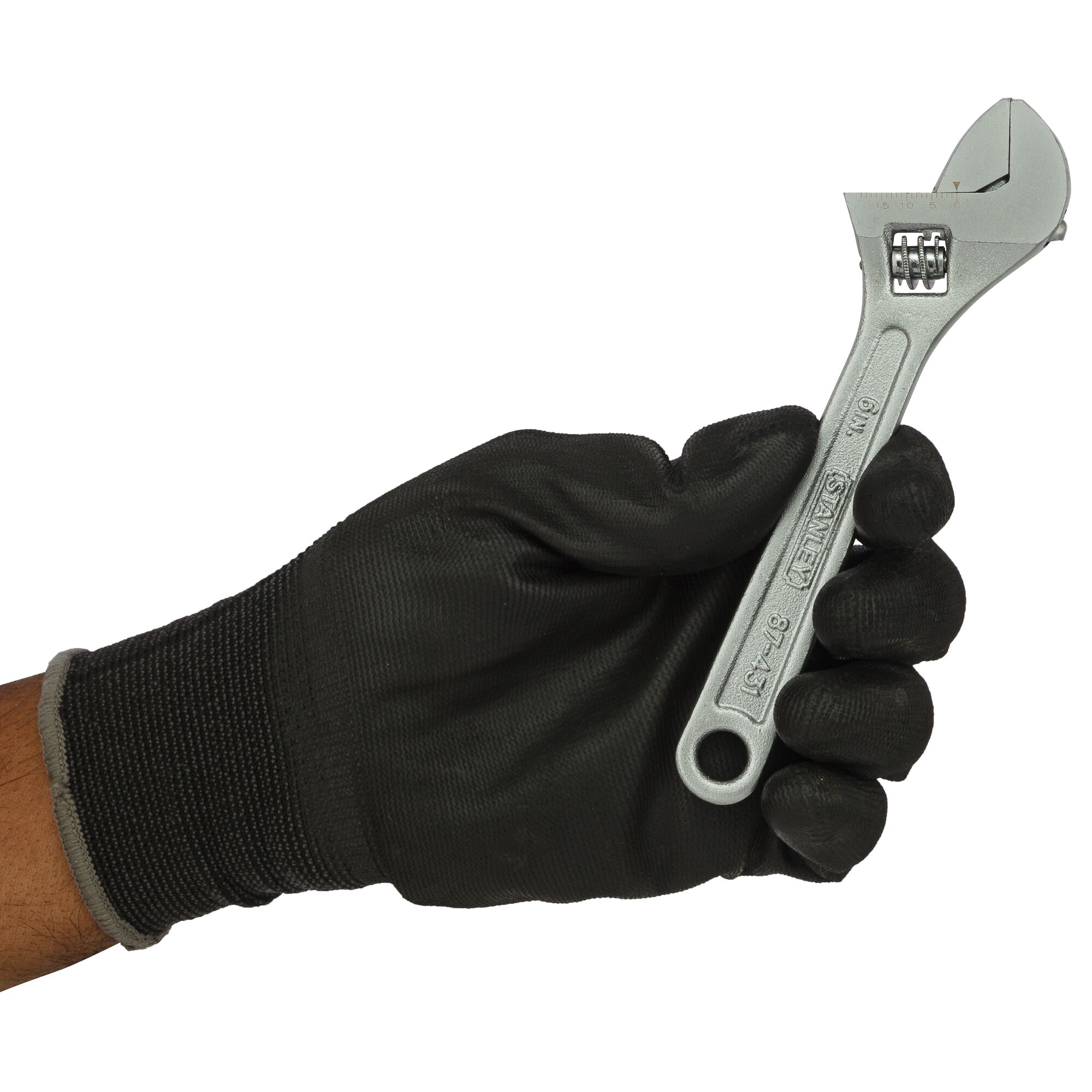 Photo of STANLEY STMT87431-8 adjustable wrench held by a black-gloved hand, side view.