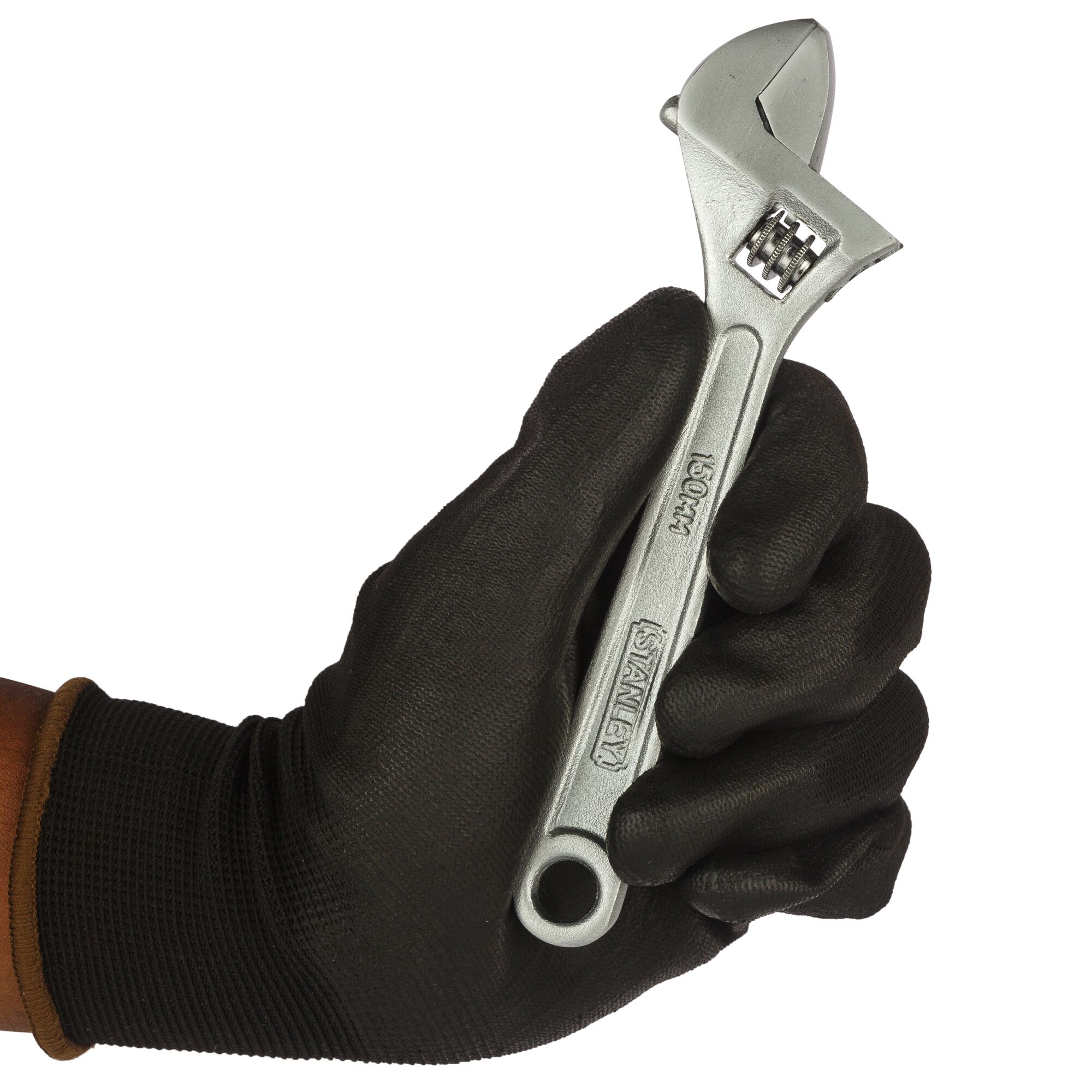 Stanley STMT87431-8 adjustable wrench held in gloved hand, close-up, product photography.
