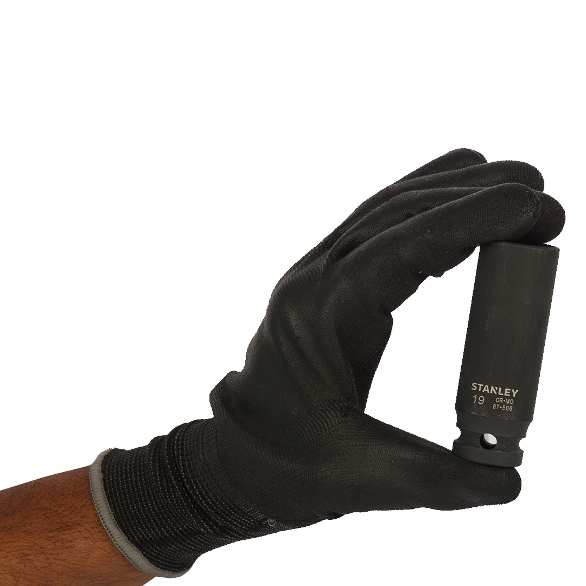 Hand in black glove holding a Stanley socket with the number 19 printed on it against a plain white background.