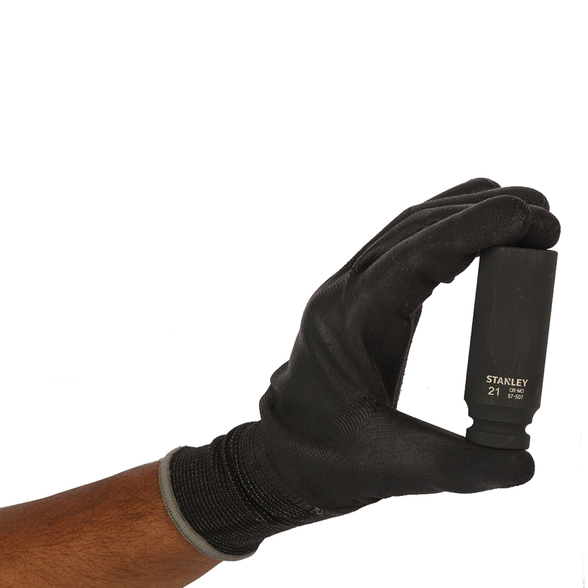 Photo of STANLEY STMT87507-8B 21mm socket held by a gloved hand, front view, on white background.