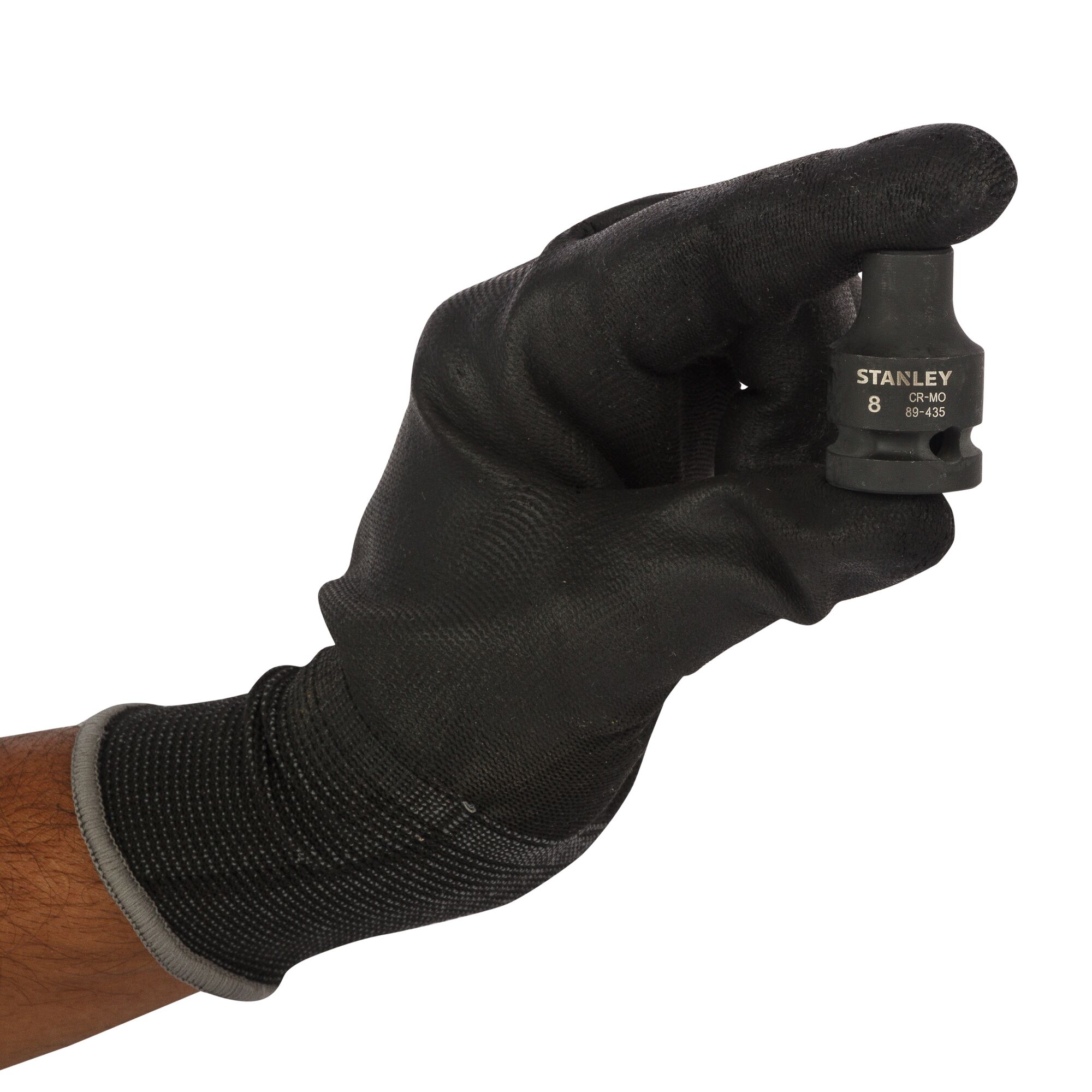Hand in black glove holding a Stanley socket tool with SKU STMT89435-8B, used for mechanical work.