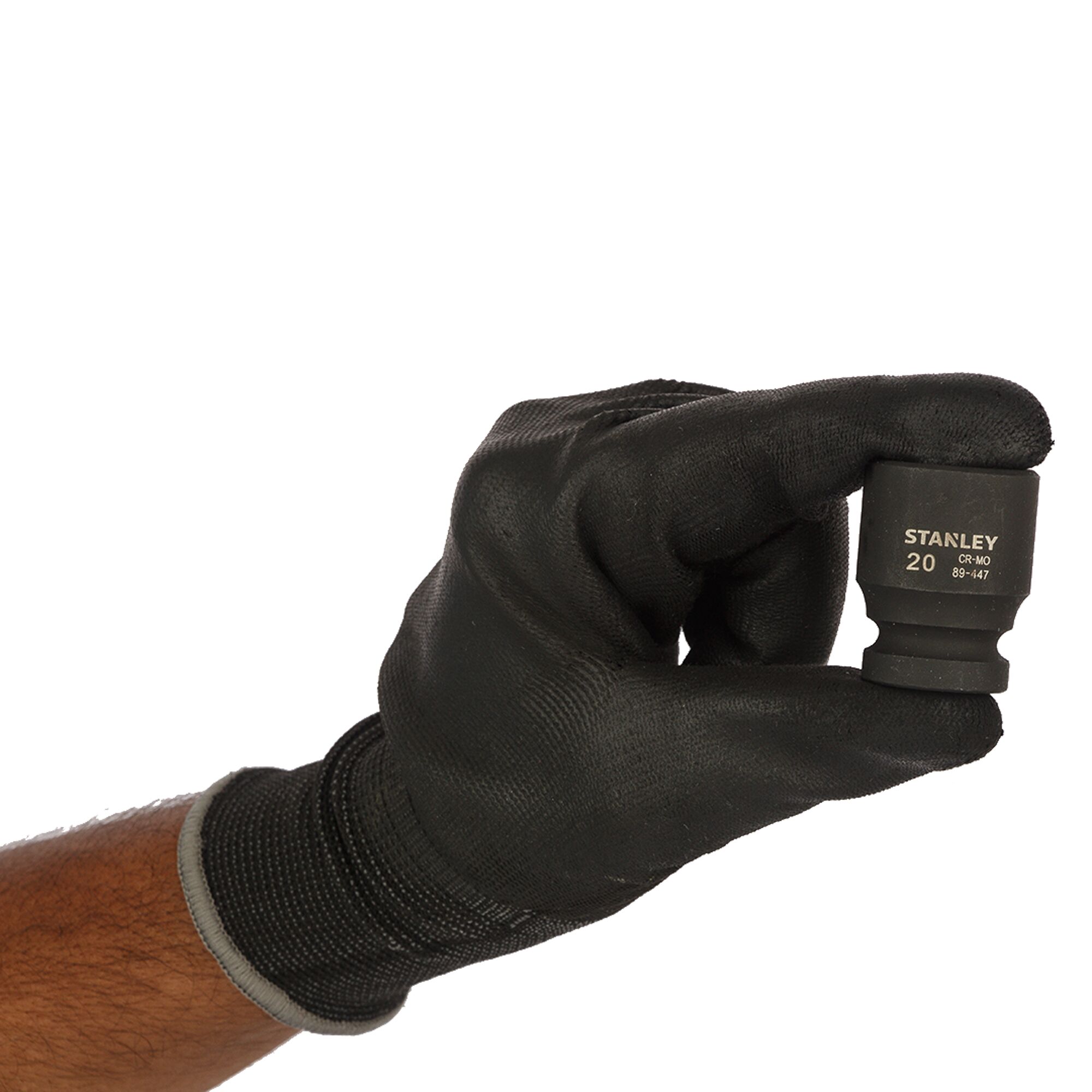 STANLEY STMT89447-8B socket held by gloved hand, black finish, front angle, tool photography.