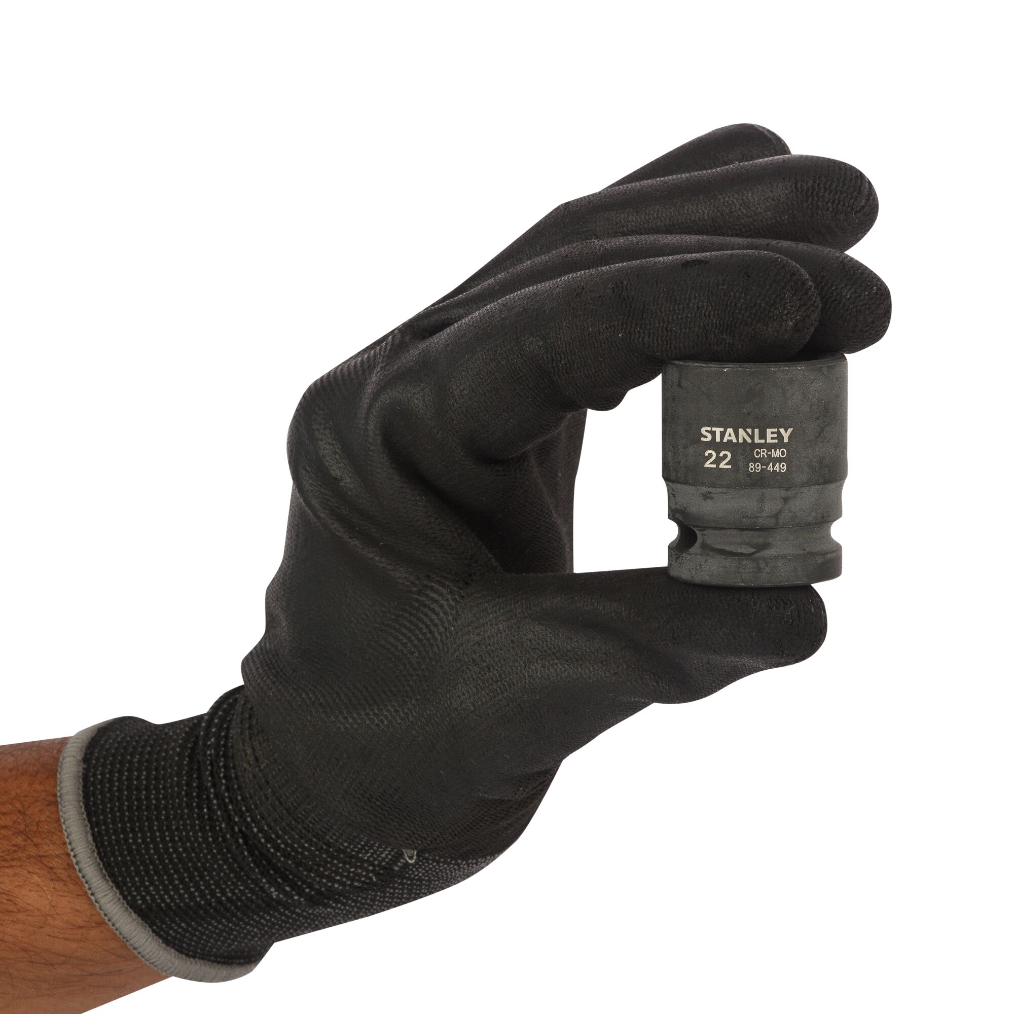 STANLEY STMT89449-8B socket held by gloved hand, product photography on white background.