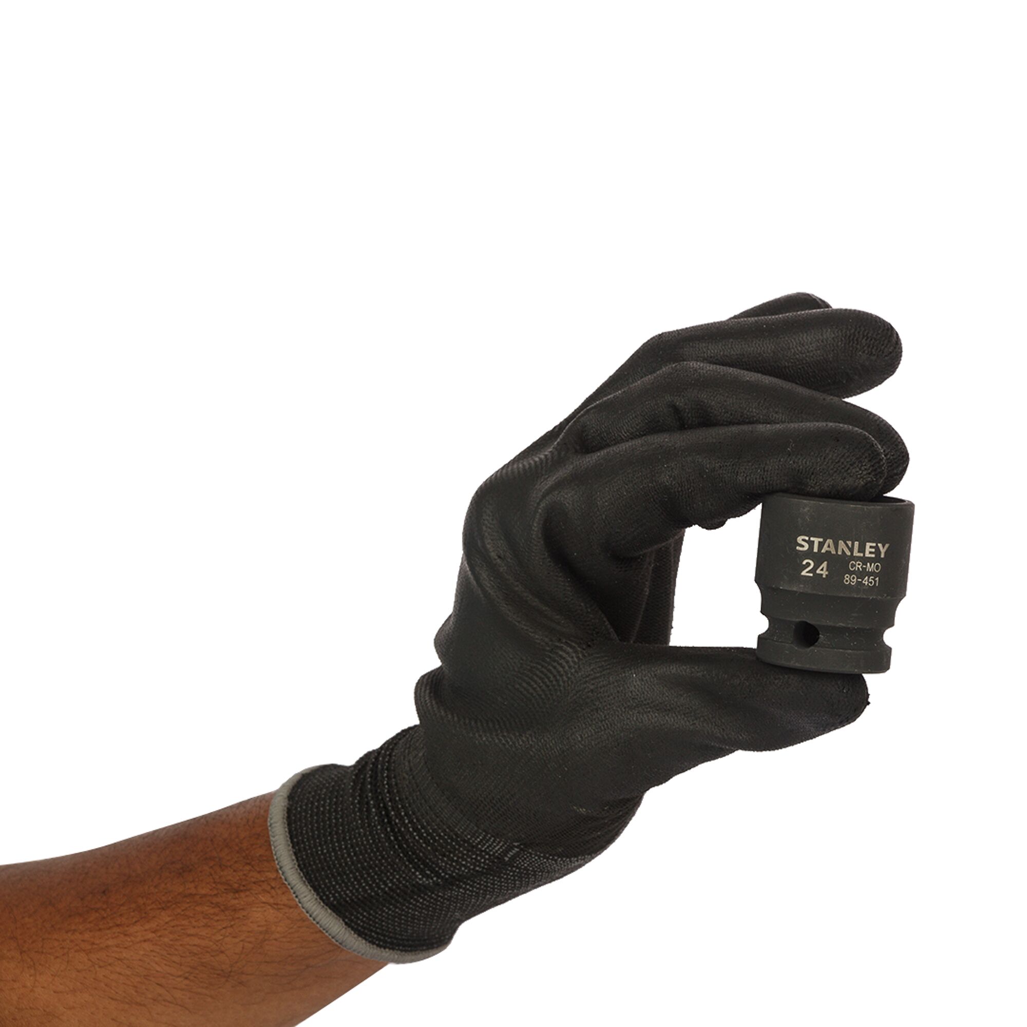 Photo of STANLEY STMT89451-8B socket held by gloved hand, front view on white background.