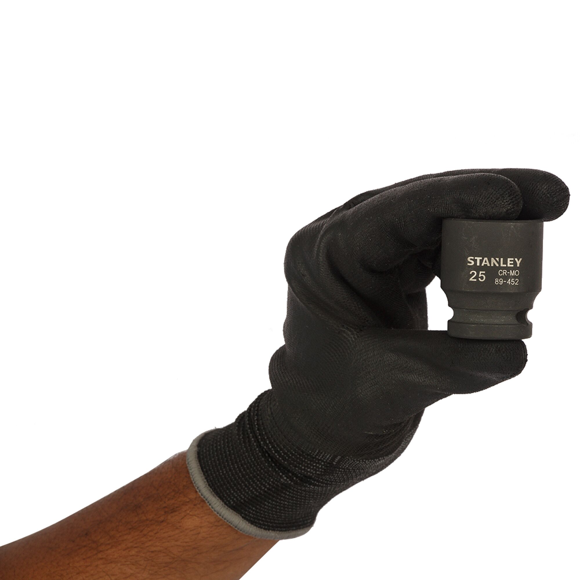 STANLEY STMT89452-8B socket held in gloved hand, front angle, black finish, tool accessory.