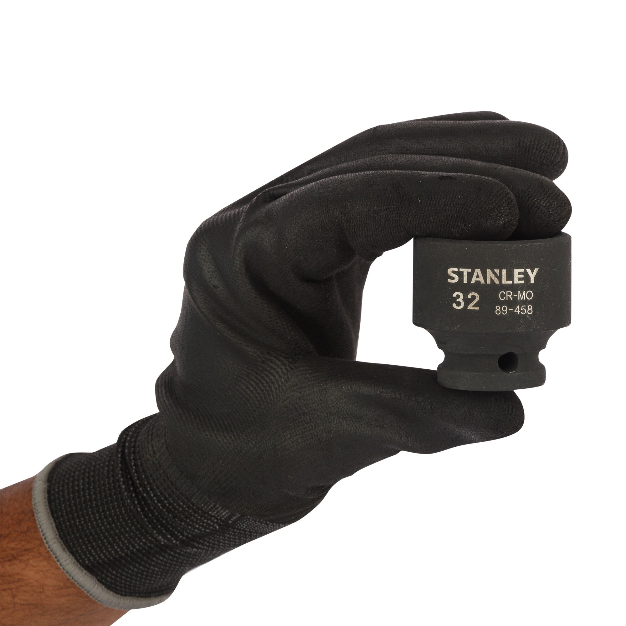 STANLEY STMT89458-8B 32mm socket held in gloved hand, product front view on white background.