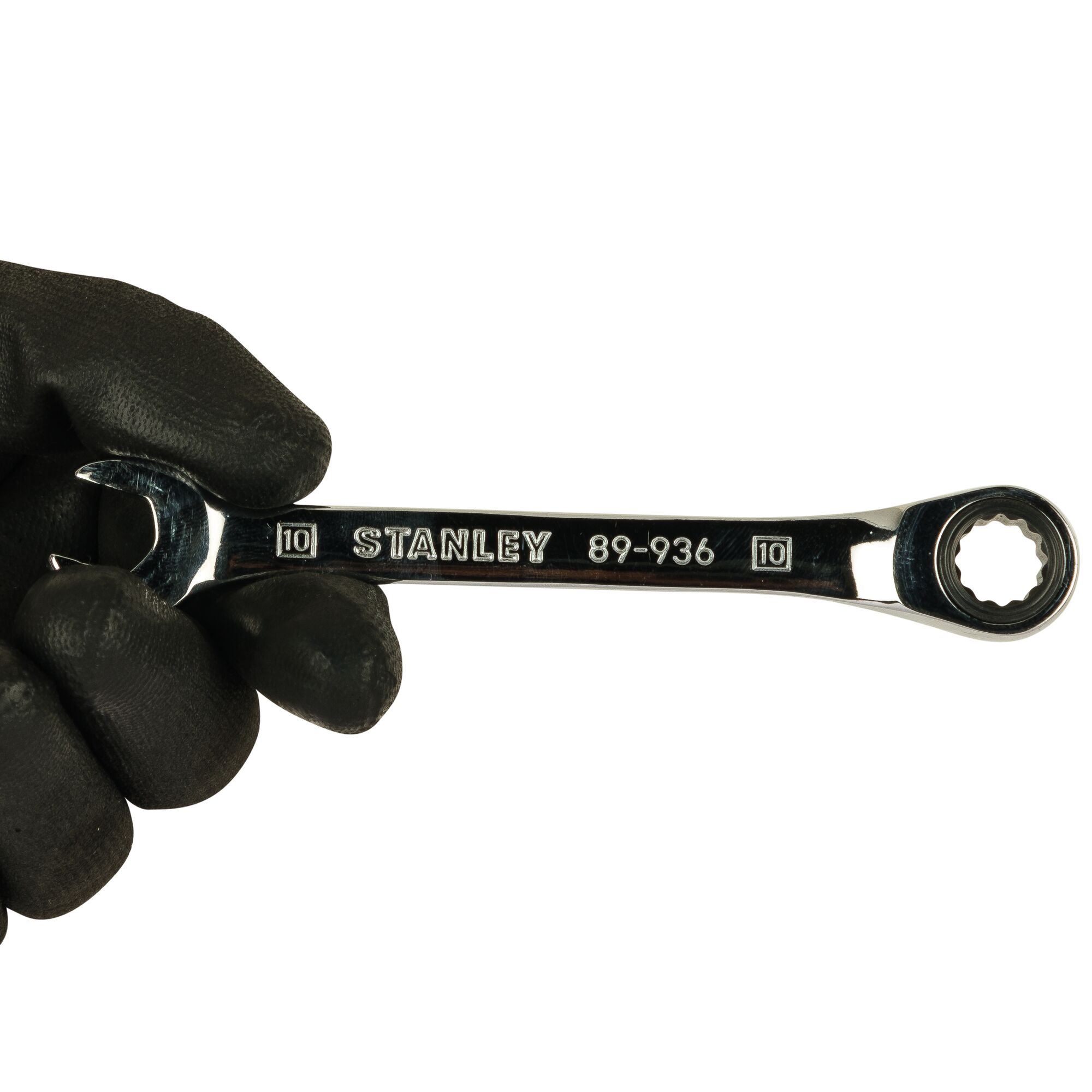 Photo of STANLEY STMT89936 combination wrench held in a gloved hand, front view, silver finish.