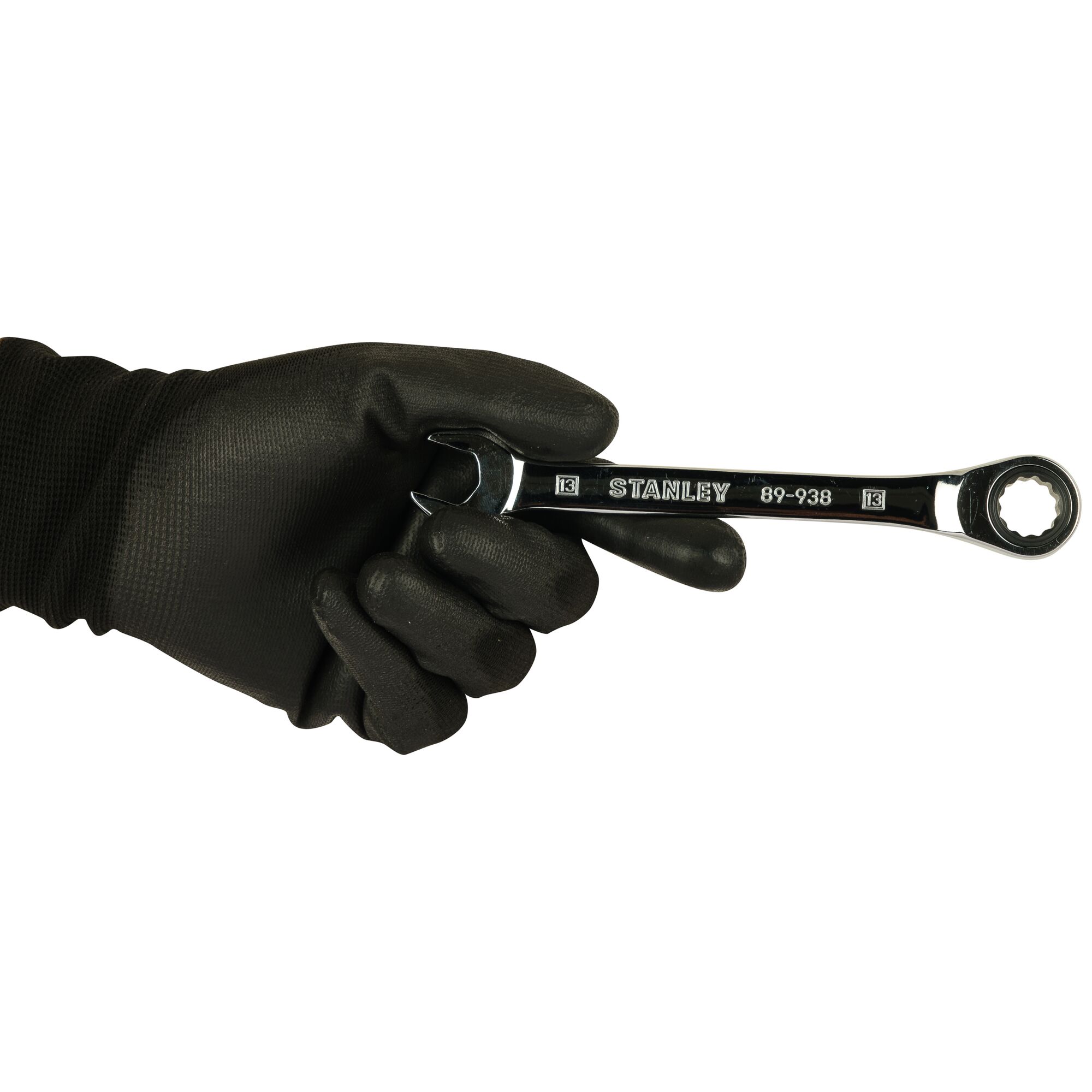 Photo of STANLEY STMT89938-8B combination wrench held in a black-gloved hand, front view.