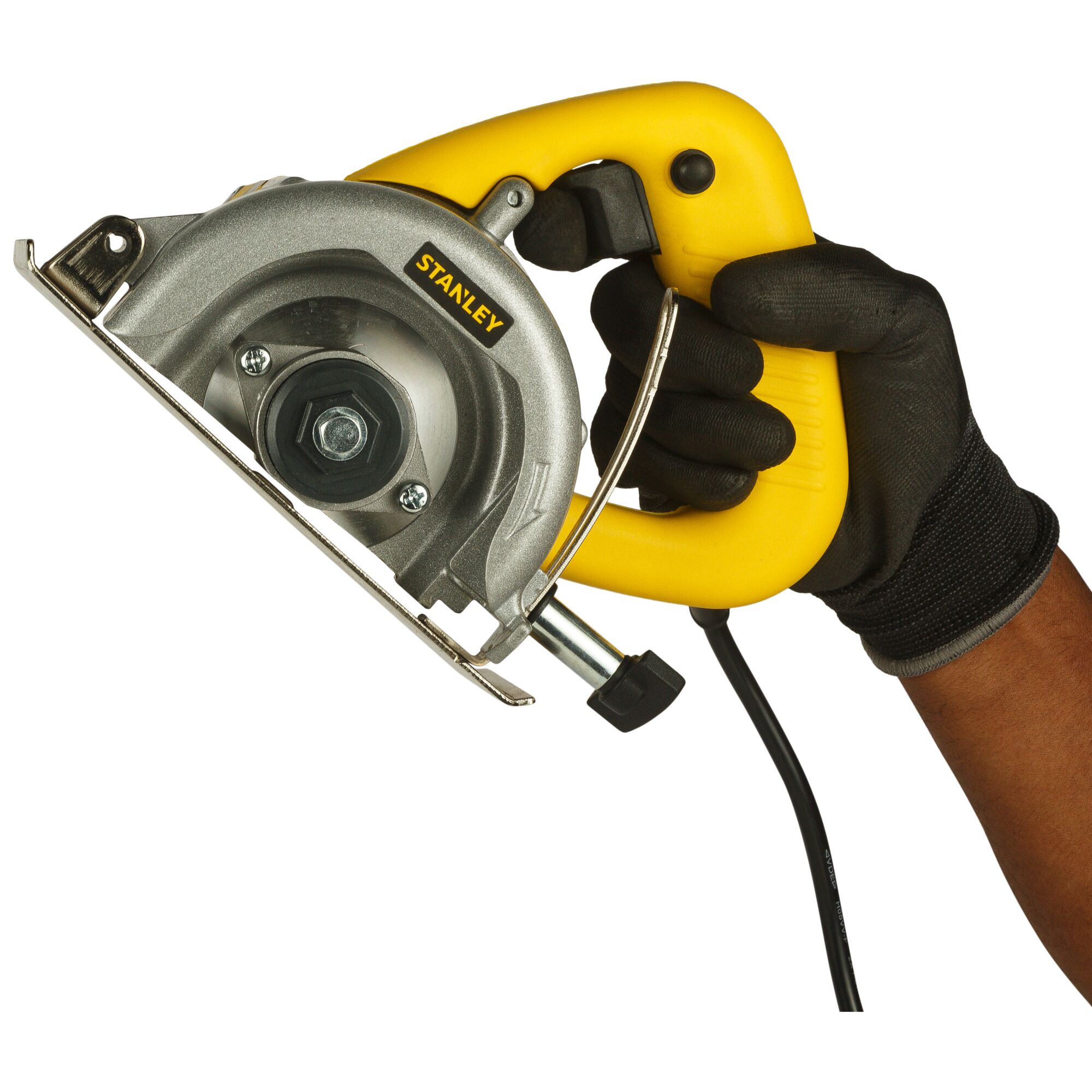 Photo of STANLEY STSP110 handheld circular saw, yellow handle, black glove, front angle.