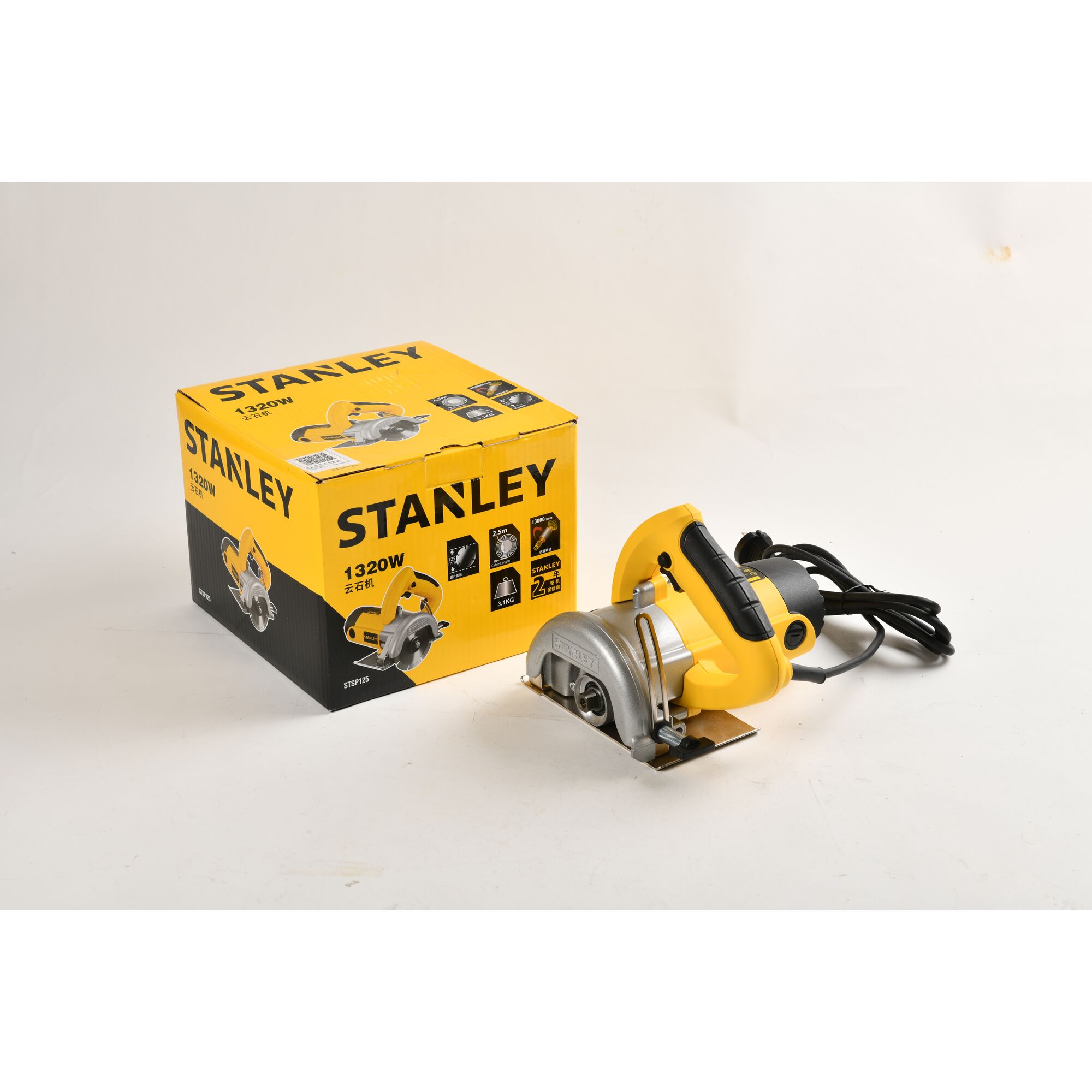 STANLEY STSP125-KR circular saw in yellow and silver with box, front angle, power cable visible.