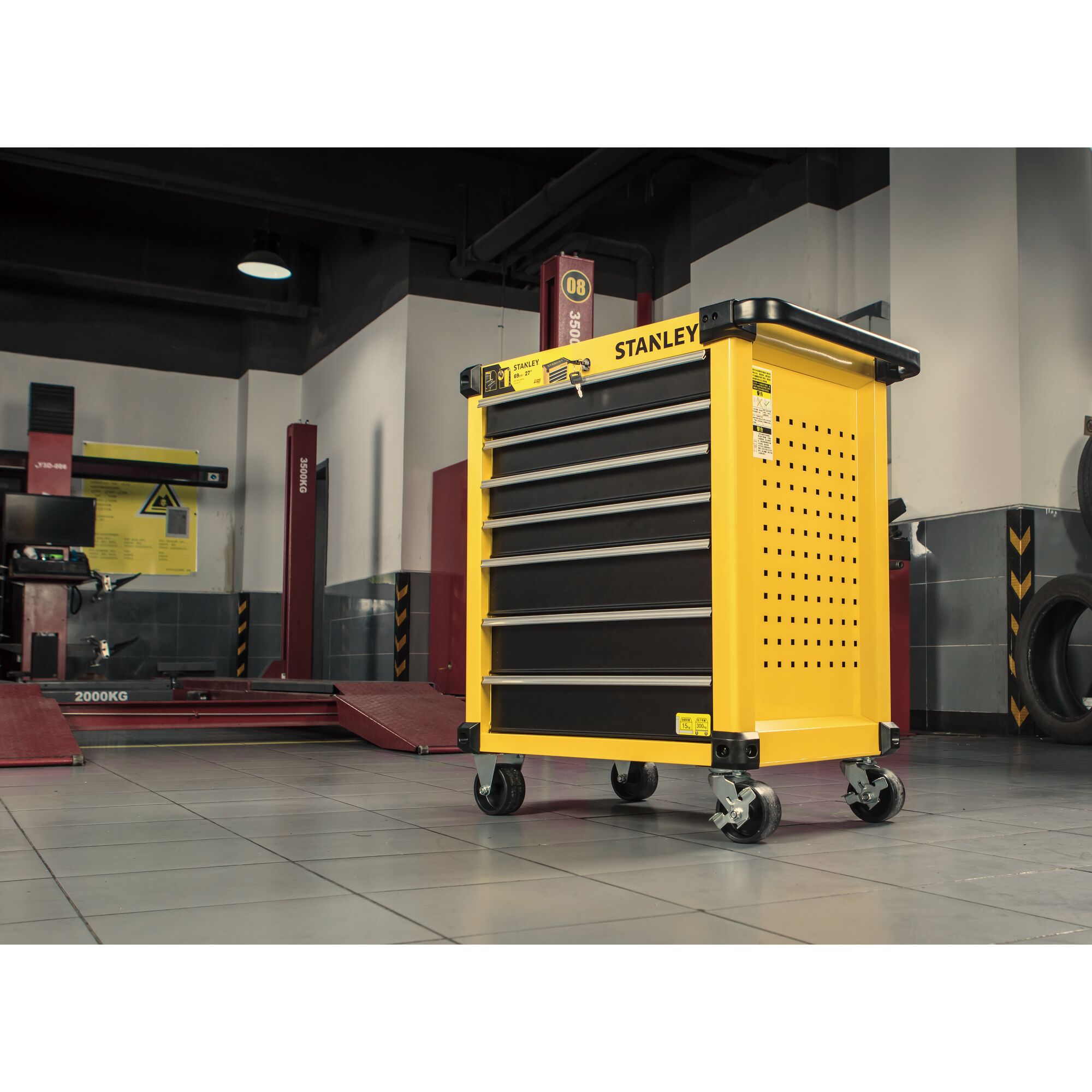 Side view of 7 drawers metal roller cabinet in a workshop